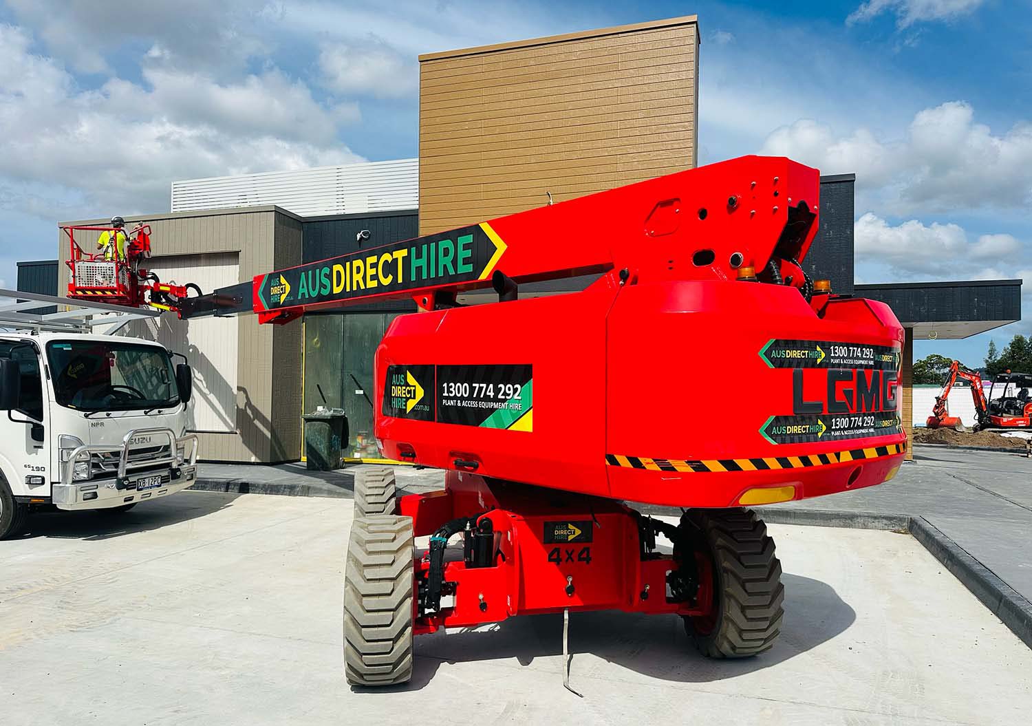heavy machinery with ausdirect hire printed on it